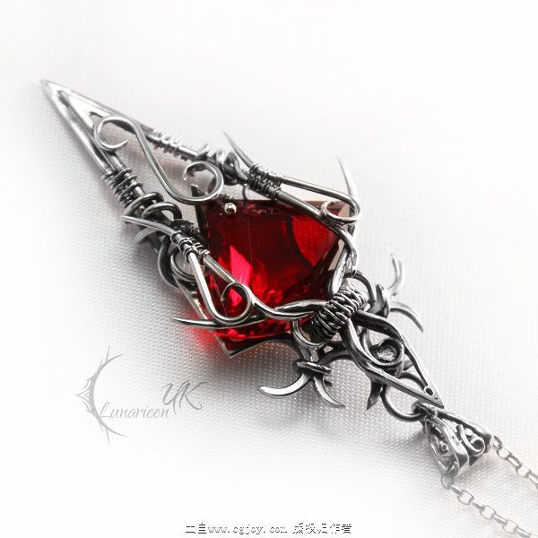 qtulmarx___silver___red_quartz_and_garnet_by_lunarieen-d6xc3if.jpg